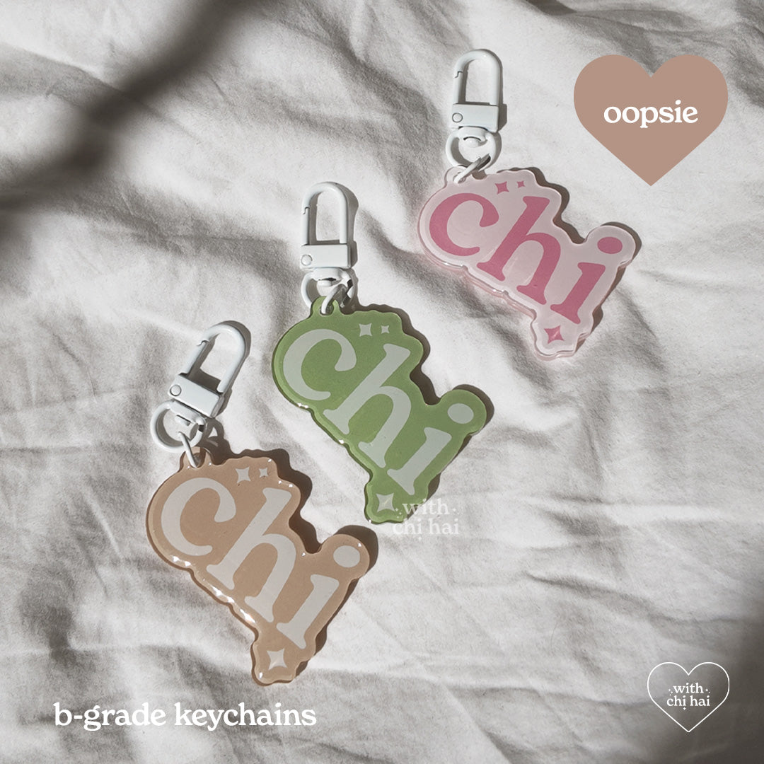 OOPSIE: chi - acrylic keychain (discounted)